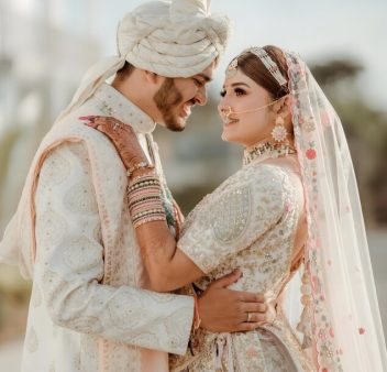 [freepicdownloader.com]-bride-groom-embrace-front-backdrop-sunset-medium